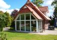 Einfamilienhaus mit Wintergarten im Landhausstil